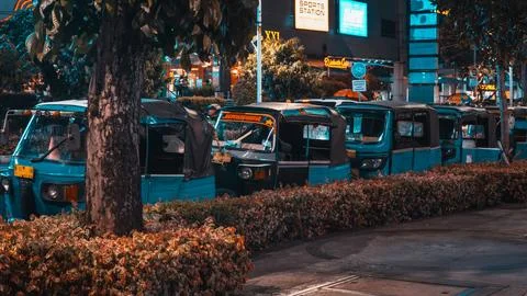 A row of blue bajaj Foto stock
