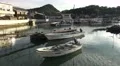 Row Boat In Fishing Village Harbor With Reflections Of Clouds And Sky 4K 4k or 4k+ Resolution
