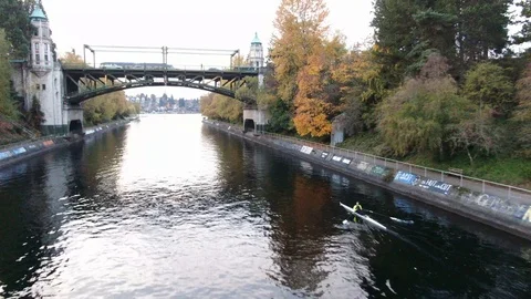 Row Boat under bridge Stock Footage 104927309