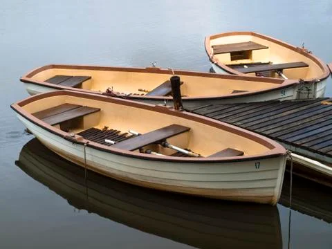 Row boats at dock Stock Photos