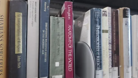 A row of books arranged Stock Footage 326567524