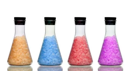 Row of bottles of bath salts Foto stock
