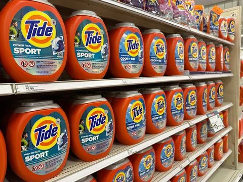 Row of bottles of Procter and Gamble Tide detergent in a Target supermarket. Stock Photos