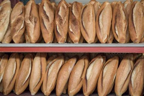 Row of breads on shelves in a bakery Stock Photos