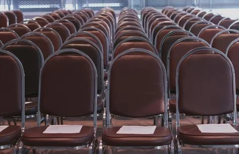 Row of brown chairs Stock Photos