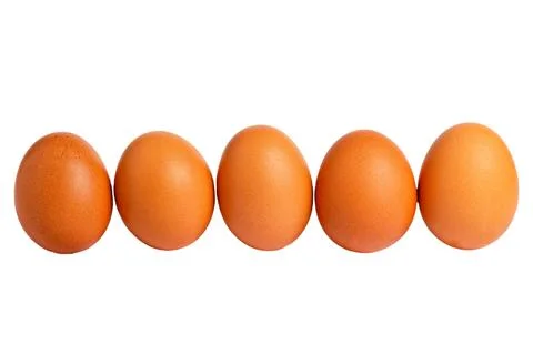 Row of brown eggs on white background 스톡 사진