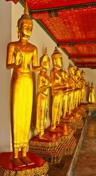 Row of buddha statues at Wat Pho Stock Photos