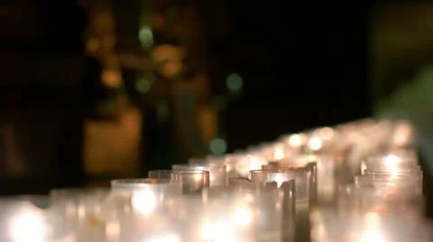 Row of Burning Candles Grouped Together Stock Footage 64142435