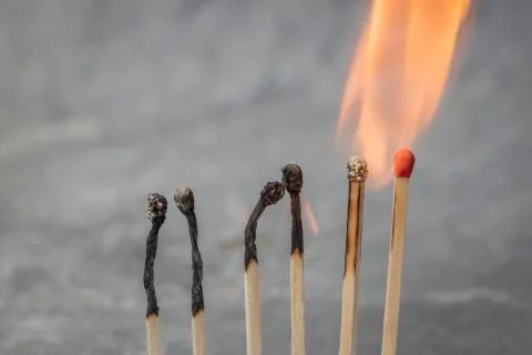 Row of burning matches Stock Photos