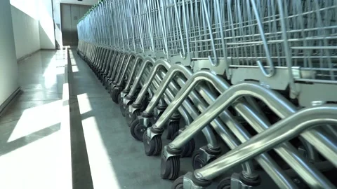 A row of carts in a shopping center. Stockbeeldmateriaal 156187672