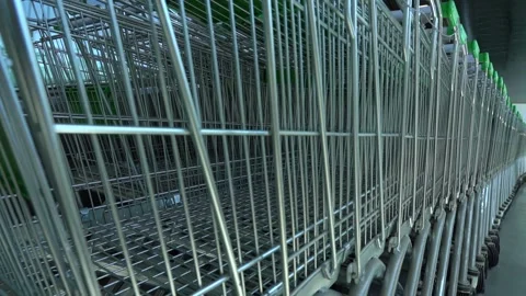 A row of carts in a shopping center. Stockbeeldmateriaal 156251684
