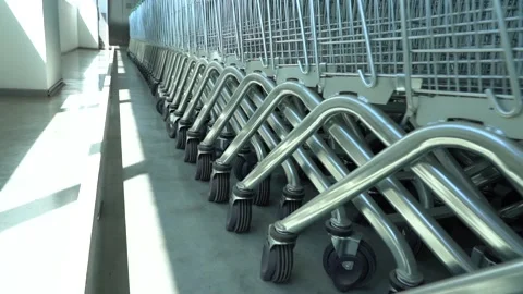 A row of carts in a shopping center. Stock Footage 167223399