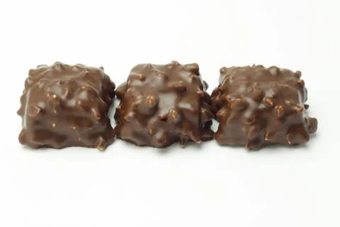 Row of chocolate cubes Stock Photos