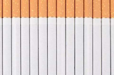 Row of cigarettes as a background Stock Photos