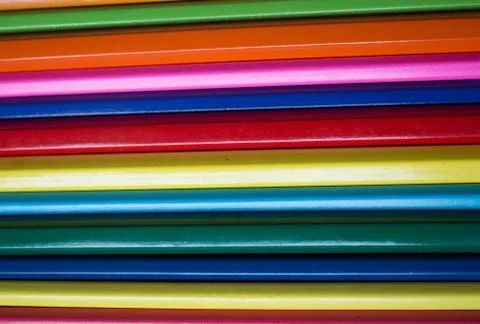 Row of colored pencils folded Stock Photos