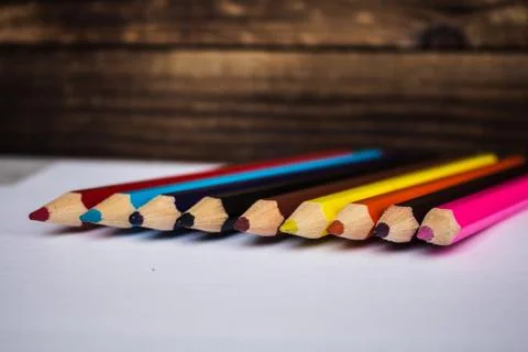 Row of colored pencils folded Stock Photos