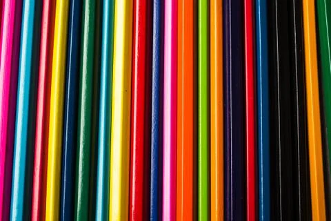 Row of colored pencils folded Stock Photos