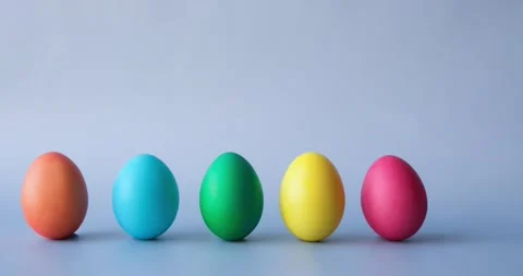 Row of colorful Easter eggs. Looped 4K stop motion animation Stock Footage 235715422