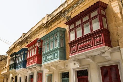 Row of colourful balconies Stock Photos