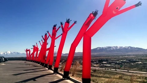 Row of Crazy Inflatable Characters HD Stock Footage 73710126