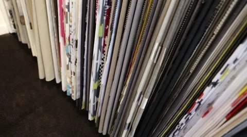 A row of curtains in an interior design store Stock Footage 60255654