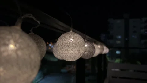 Row of Decorative String Light Balls in the Dark Video stock 316146158