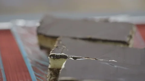 Row of dessert in store front display case Stock Footage 104868623