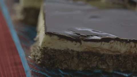 Row of dessert in store front display case Stock Footage 104868636