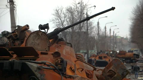 A row of destroyed tanks in Bucha Vídeos de archivo 218376975