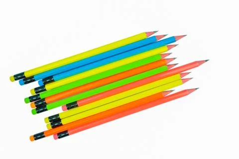 A row of different colored normal wood pencil on a white paper background Stock Photos