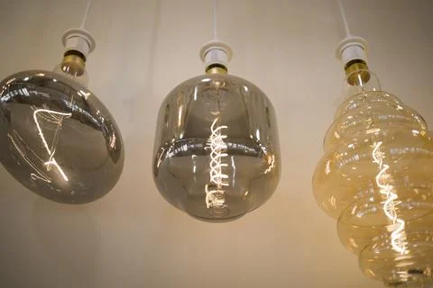 Row of different types of light bulbs . Close up Stock Photos