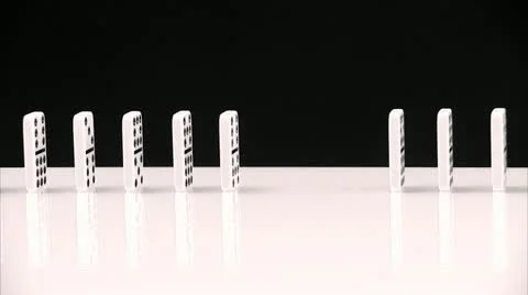 Row of Domino Tiles falling Stock Footage 11332826