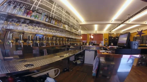 Row of Draft Beer Taps at Modern Pub Counter Interior Stock Footage 344957431