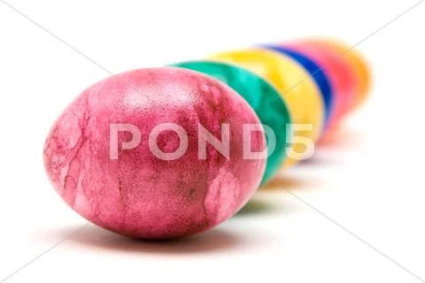 Row of Easter Eggs Isolated on a White Background Stock Photos