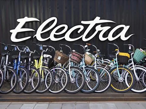 Row of Electra bicycles standing outdoors for sale Stock Photos