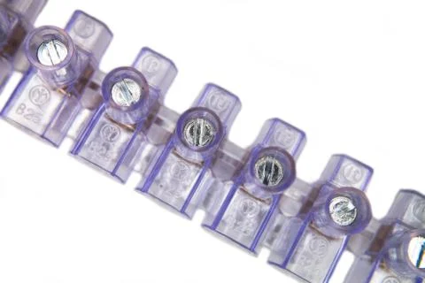 Row of electric clamps on a white background Foto stock