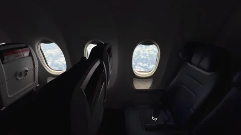 Row of Empty Airplane Seats Beside Windows during the flight. Expensive tickets Stock Footage 342898217