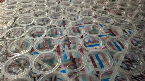 Row of Empty Clear Plastic Cups Preparation For Beverage Pack Stock Photos