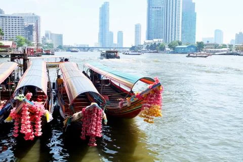 Row of Empty Colorful Long Tail Boats in Thailand Stock Photos