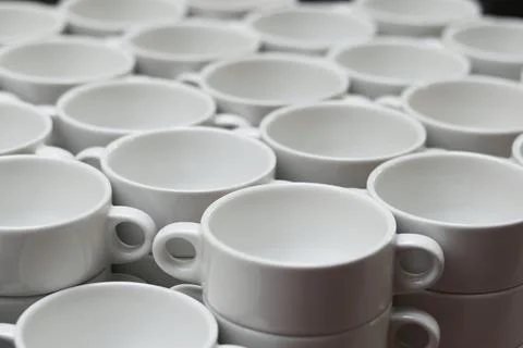 A row of empty cups can be a void waiting to be filled Stock Photos