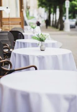 Row of empty outdoor cafe Stock Photos