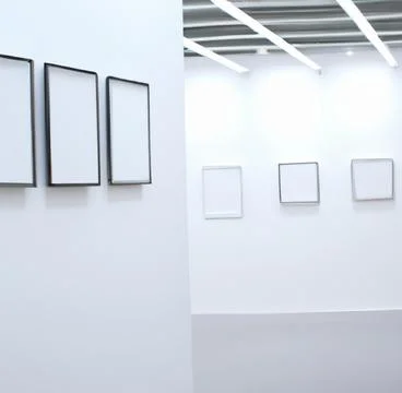 Row of empty picture frames on a wall of an art gallery Stock Photos