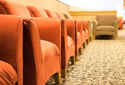 Row of empty plush armchairs Stock Photos