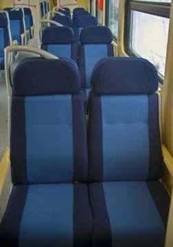 Row of empty seats in train wagon Stock Photos