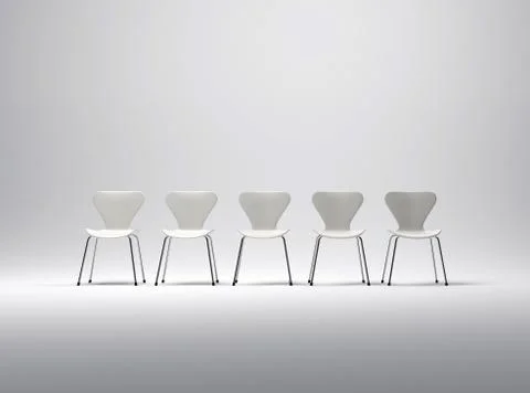 Row of five white plastic and metal chairs in a neutral background Stock Illustration