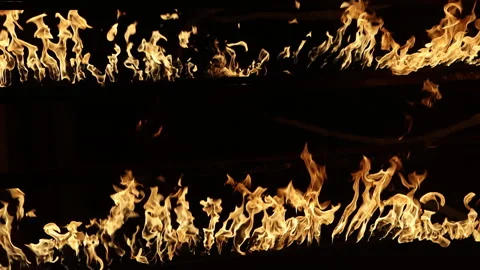 Row of flames at night Stock-Footage 324526072