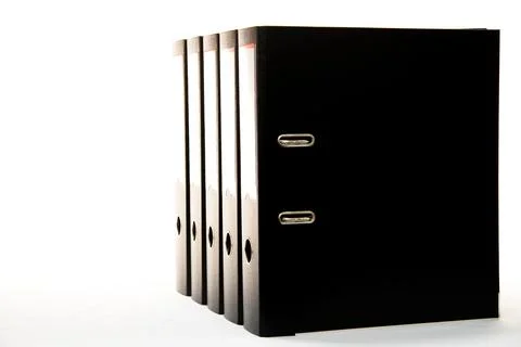 Row of folders for papers and documentation on a shelf in the office 스톡 사진