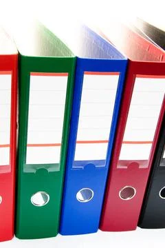 Row of folders for papers and documentation on a shelf in the office 스톡 사진