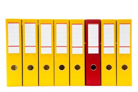 Row of folders for papers and documentation on a shelf in the office 스톡 사진