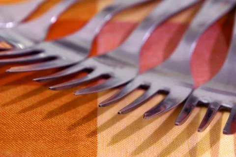 Row of forks Stock Photos